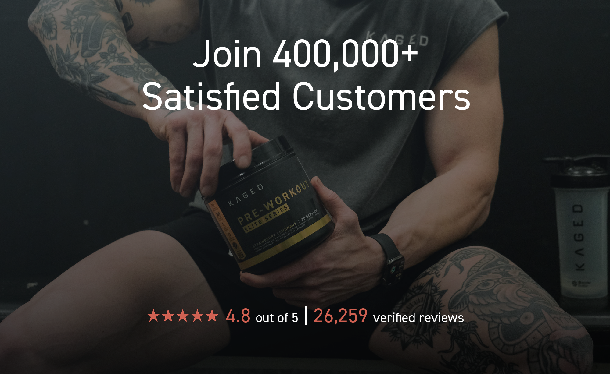 Person holding Kaged Pre Workout with text Join 400,000 plus satisfied customers and 4.8 out of 5 from 26,259 reviews