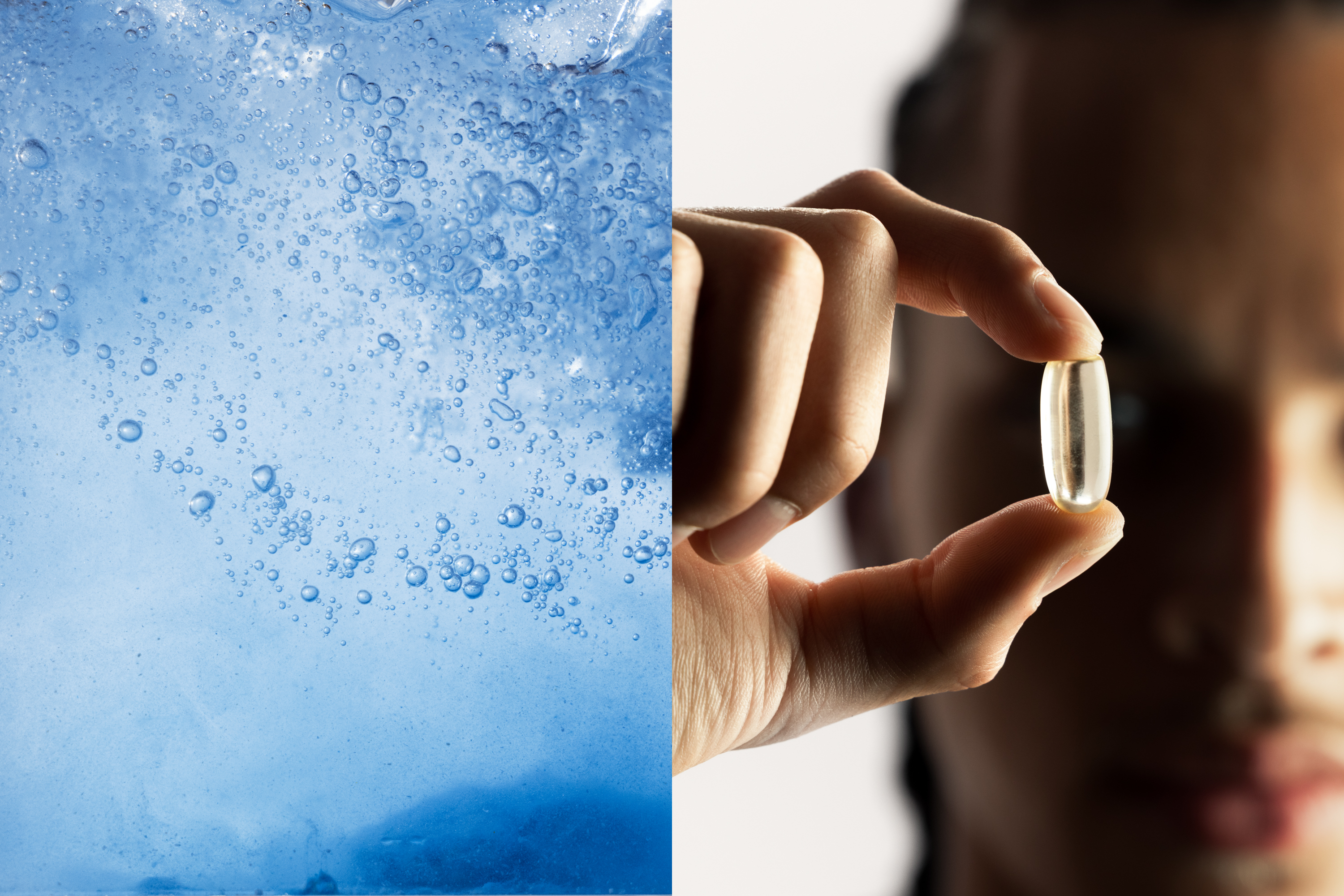 Person holding a clear softgel capsule beside bubbling blue water background suggesting supplements and hydration